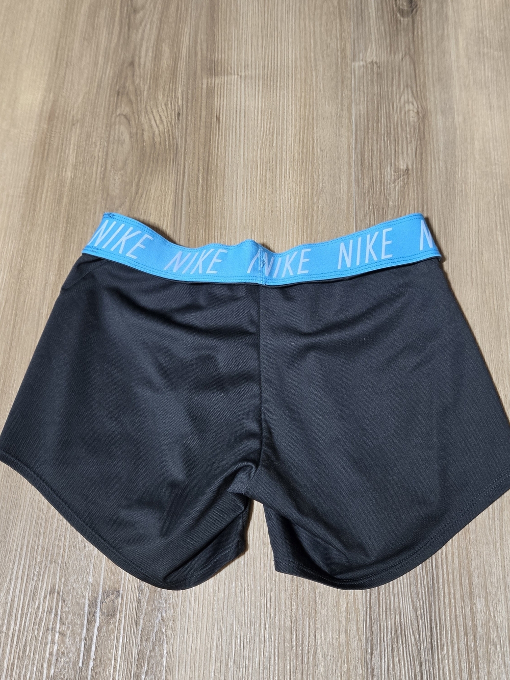 Nike Women’s Black Athletic Shorts with Bright Baby Blue Accents - Picture 2 of 4